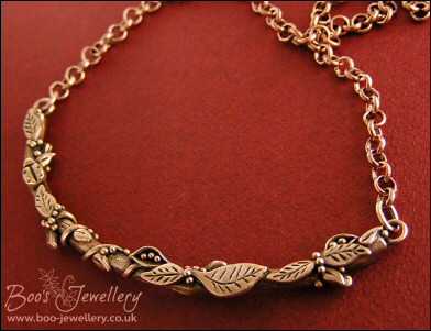 Twig necklace hand sculpted with leaves, seed pods and berries