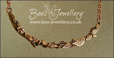 Twig necklace hand sculpted with leaves, seed pods and berries