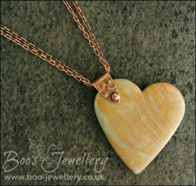 Polymer clay heart pendant with copper crackle and copper bail