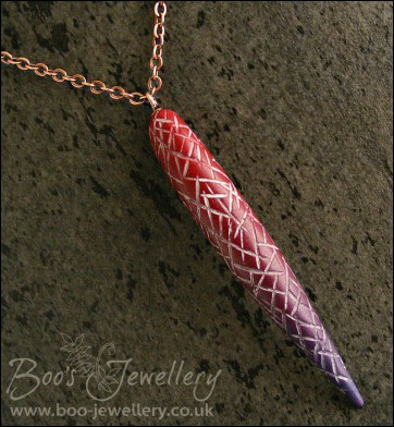 Carved polymer clay torpedo pendant and earring set