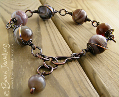 Botswana agate and oxidised copper spiral wrapped bracelet
