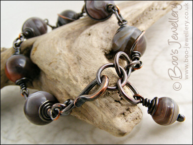 Botswana agate and oxidised copper spiral wrapped bracelet