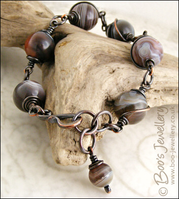 Botswana agate and oxidised copper spiral wrapped bracelet