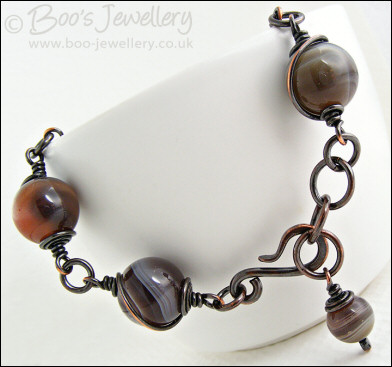 Botswana agate and oxidised copper spiral wrapped bracelet