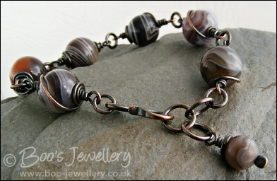 Botswana agate and oxidised copper spiral wrapped bracelet