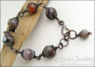 Botswana agate and oxidised copper spiral wrapped bracelet