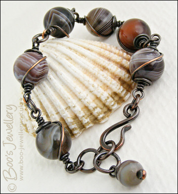 Botswana agate and oxidised copper spiral wrapped bracelet