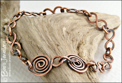 Antiqued copper 8 link bracelet with feature spiral clasp