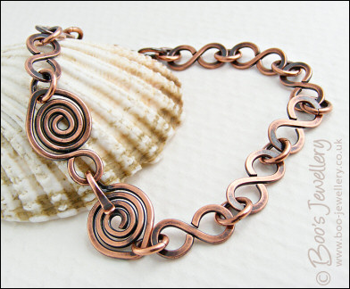 Antiqued copper 8 link bracelet with feature spiral clasp