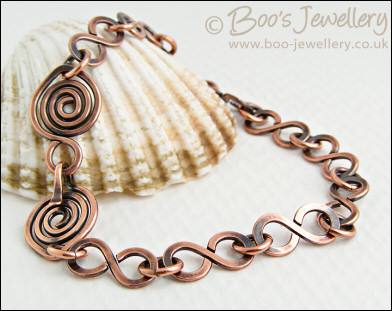 Antiqued copper 8 link bracelet with feature spiral clasp