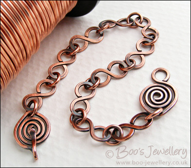 Antiqued copper 8 link bracelet with feature spiral clasp
