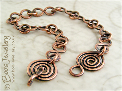 Antiqued copper 8 link bracelet with feature spiral clasp