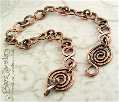 Antiqued copper 8 link bracelet with feature spiral clasp