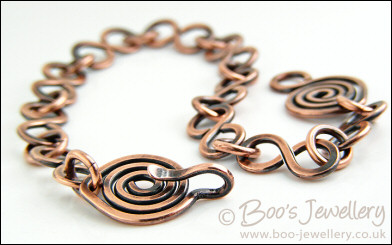 Antiqued copper 8 link bracelet with feature spiral clasp