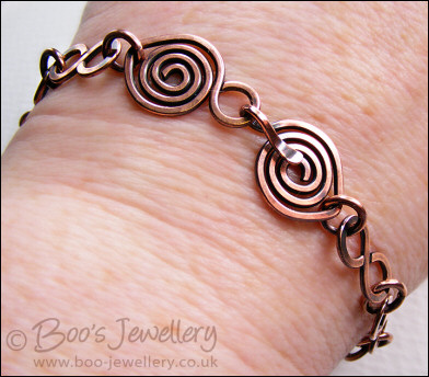 Antiqued copper 8 link bracelet with feature spiral clasp