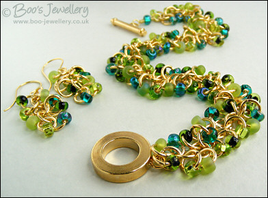 Gold plated beaded bracelet & earrings in greens
