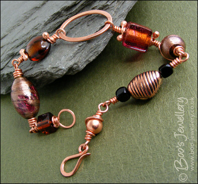 Polished copper and handmade glass bead bracelet