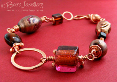Polished copper and handmade glass bead bracelet