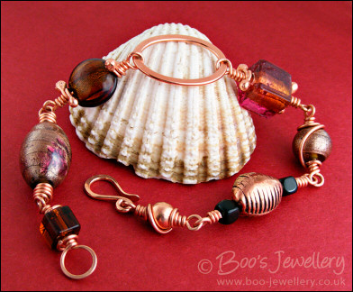 Polished copper and handmade glass bead bracelet
