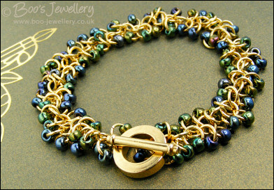 Gold plated Shaggy Loops bracelet in blue greens