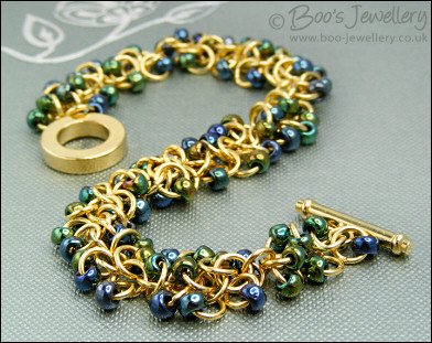 Gold plated Shaggy Loops bracelet in blue greens