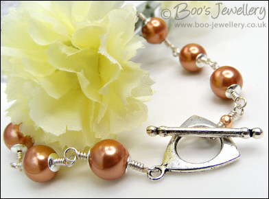 Copper seashell pearl toggle bracelet in Sterling silver