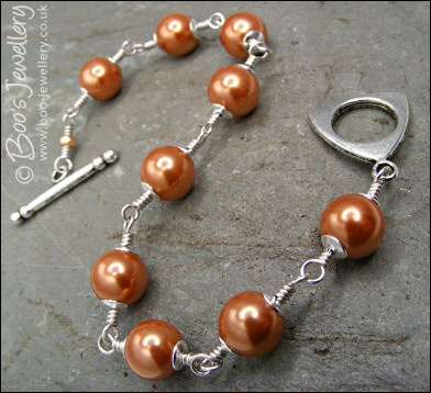 Copper seashell pearl toggle bracelet in Sterling silver
