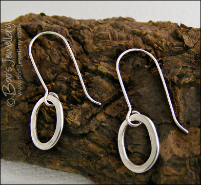 Polished Sterling silver hammered oval earrings