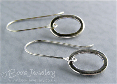 Polished Sterling silver hammered oval earrings