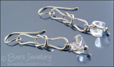 Sterling silver knot earrings with icy rock crystal chips