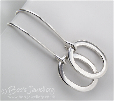 Polished Sterling silver hammered oval earrings
