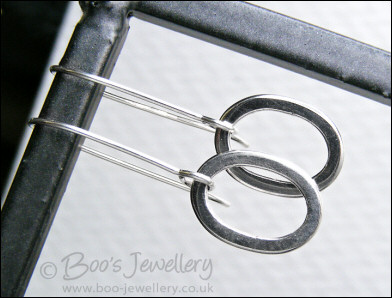 Polished Sterling silver hammered oval earrings