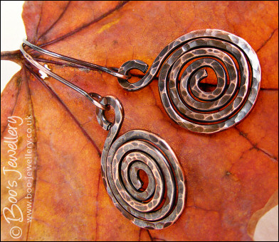 Hammered and oxidised copper spiral earrings
