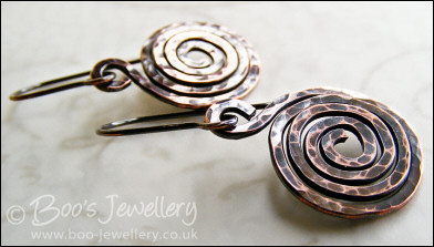 Hammered and oxidised copper spiral earrings
