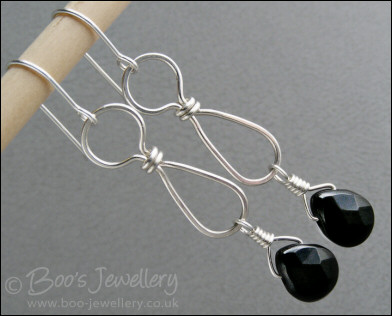 Sterling silver teadrop earrings with faceted Onyx briolettes