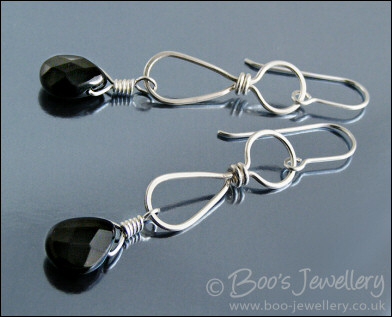 Sterling silver teadrop earrings with faceted Onyx briolettes