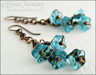Teal glass flower and oxidised copper chain earrings