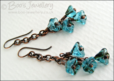 Teal glass flower and oxidised copper chain earrings