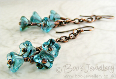Teal glass flower and oxidised copper chain earrings