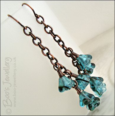 Teal glass flower and oxidised copper chain earrings