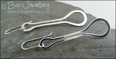 Sterling silver highly polished teardrop loop earrings