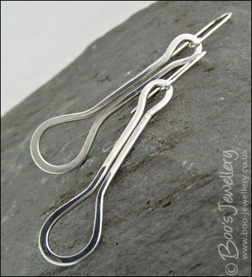Sterling silver highly polished teardrop loop earrings
