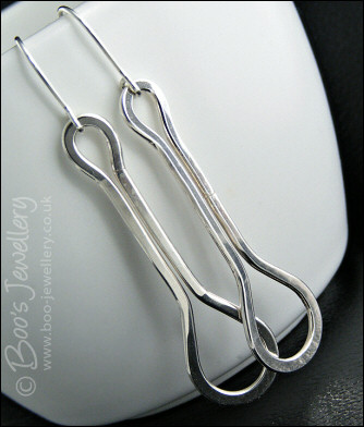 Sterling silver highly polished teardrop loop earrings