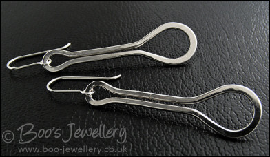 Sterling silver highly polished teardrop loop earrings