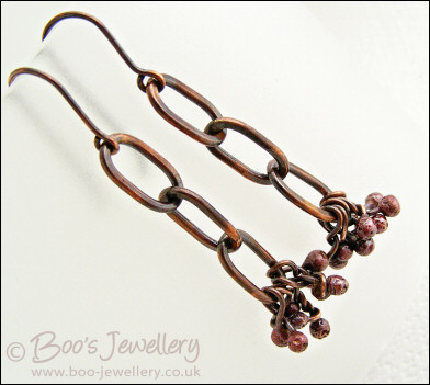 Antiqued copper long link earrings with rosy copper buds