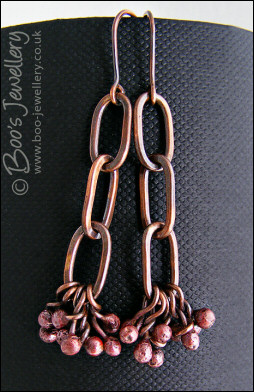 Antiqued copper long link earrings with rosy copper buds