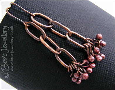 Antiqued copper long link earrings with rosy copper buds