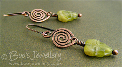 Antiqued copper leaf theme earrings