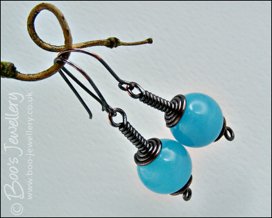 Darkly gunmetal copper earrings with turquoise dyed jade