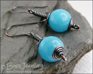 Darkly gunmetal copper earrings with turquoise dyed jade